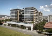 Fachada externa do condomínio com piscina na cobertura — Villa del Mar